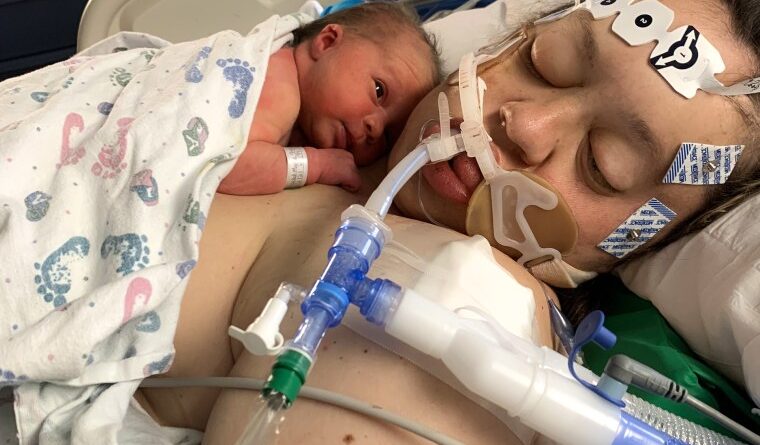 Becky Munge in hospital two days after giving birth to her daughter Jovie.